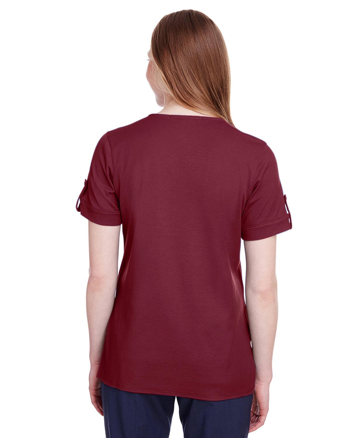 DG20WB Devon & Jones Ladies CrownLux Performance Plaited Rolled-Sleeve Top - Back Image