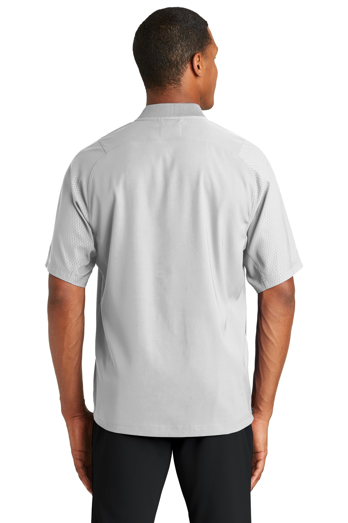 NEA600 New Era Cage Short Sleeve 1/4-Zip Jacket. - Back Image